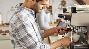 Man pouring a coffee