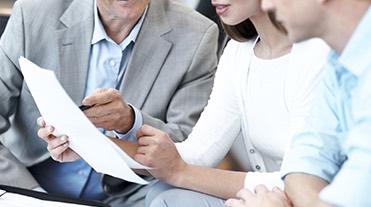 People having looking at a paper